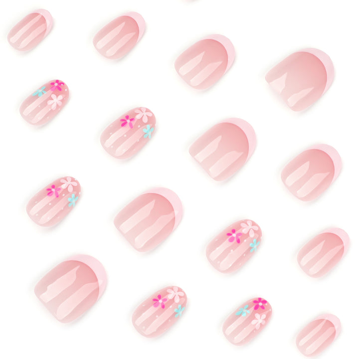 Artful nail extensions with colorful floral designs and glitter Stornfield