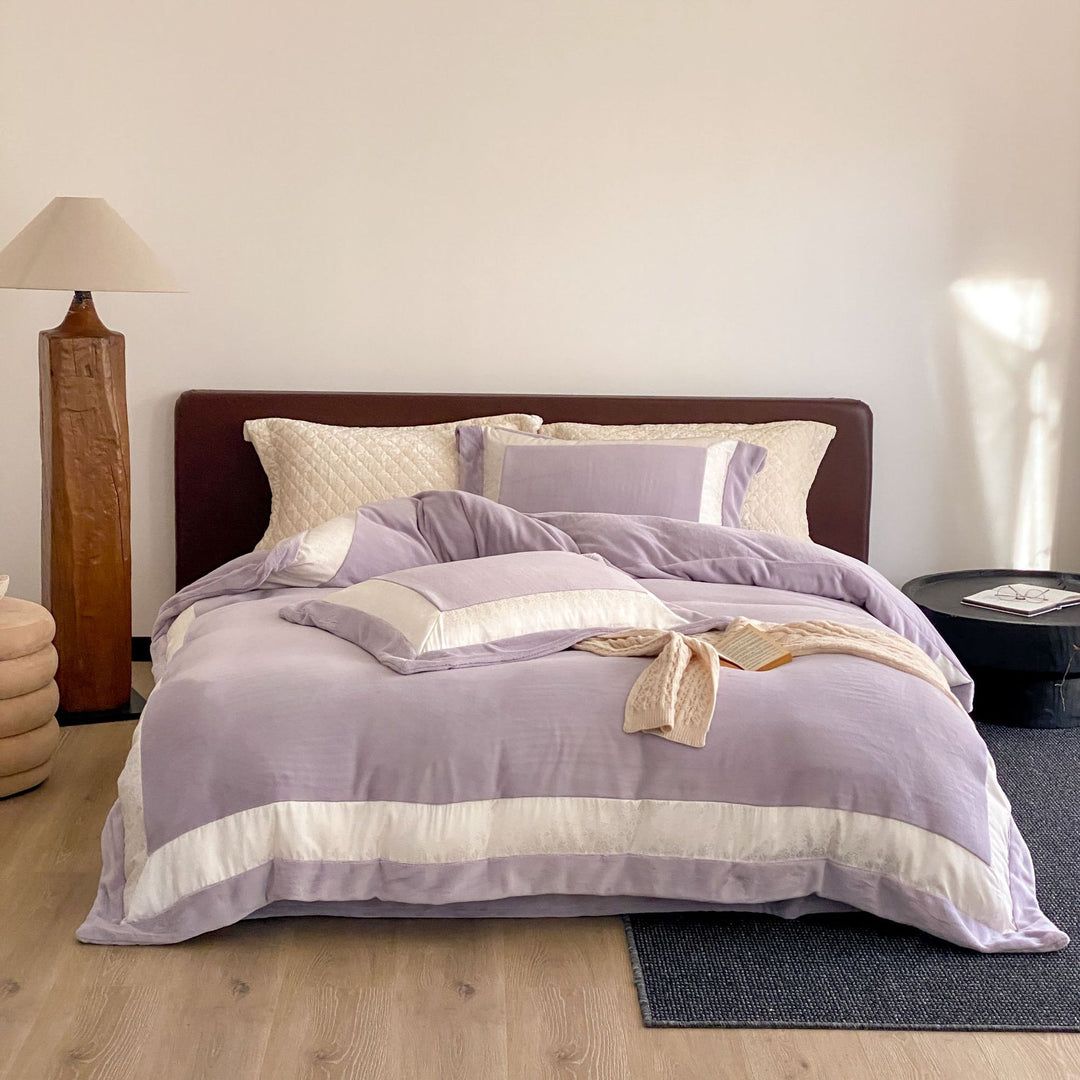Luxurious cotton satin bedding set with quilted decorative border Stornfield