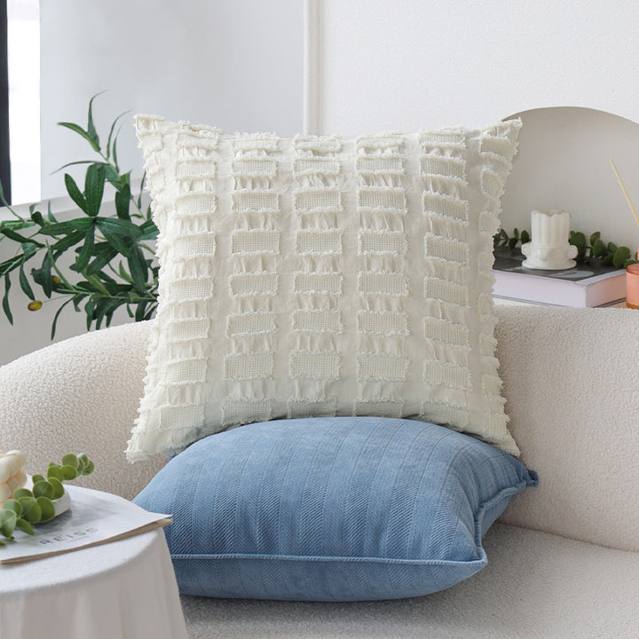 Decorative cushion with textured weave design