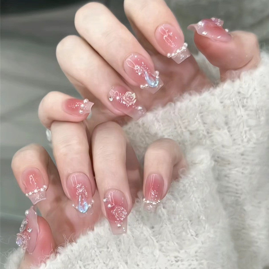 Glamorous artificial fingernails with glitter and moon designs Stornfield