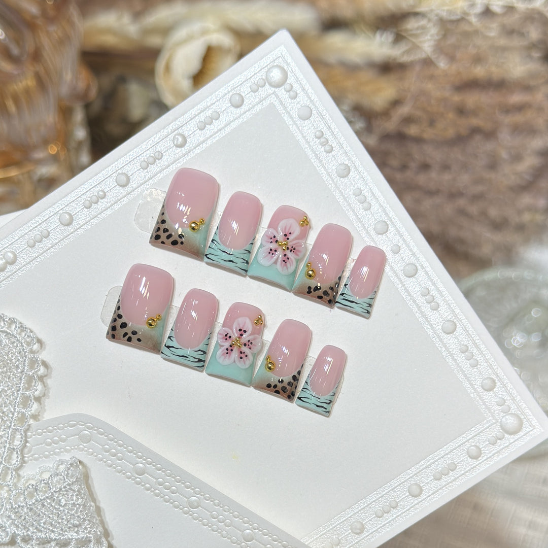 Artistic Press-On Nail Set with Floral and Patterned Design Stornfield
