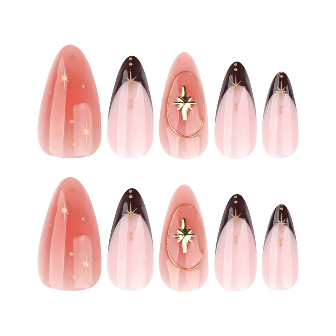 Artful stiletto nails with elegant gold embellishments Stornfield