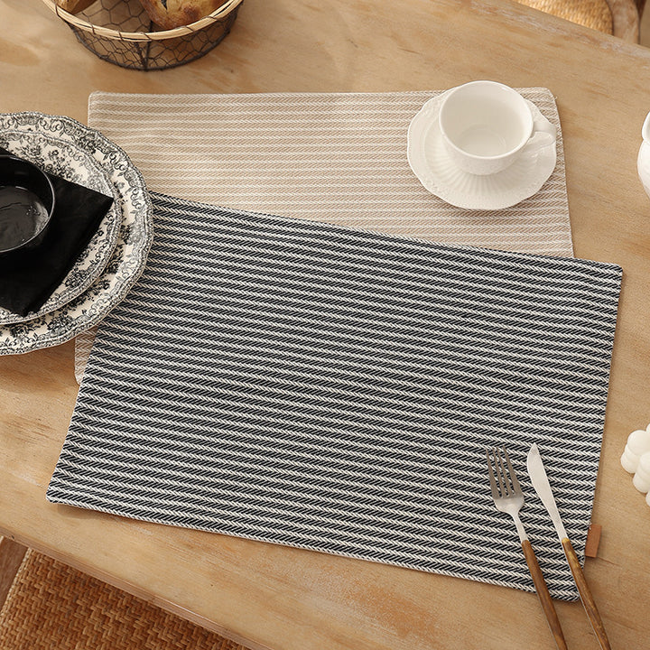 Rectangular table set made of woven herringbone cotton blend with anti-slip coating Stornfield