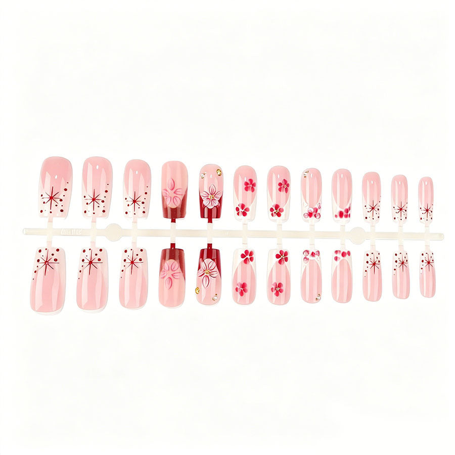 Nail art set with floral 3D details and glitter accents Stornfield