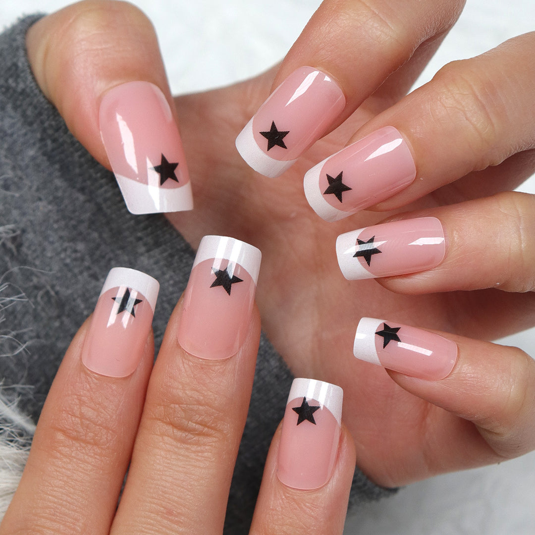 Artistic French Tip Press-On Nails with Star Accents Stornfield