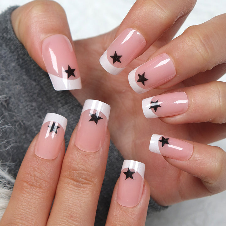 Artistic French Tip Press-On Nails with Star Accents Stornfield