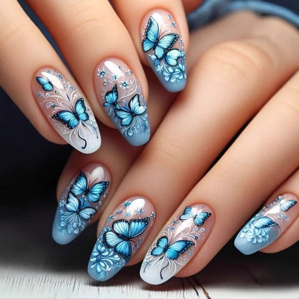 Art nail set with filigree butterfly and flower motifs Stornfield