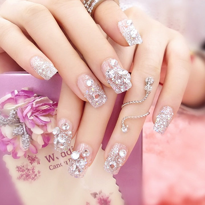 Artificial nails with delicate floral decorations Stornfield