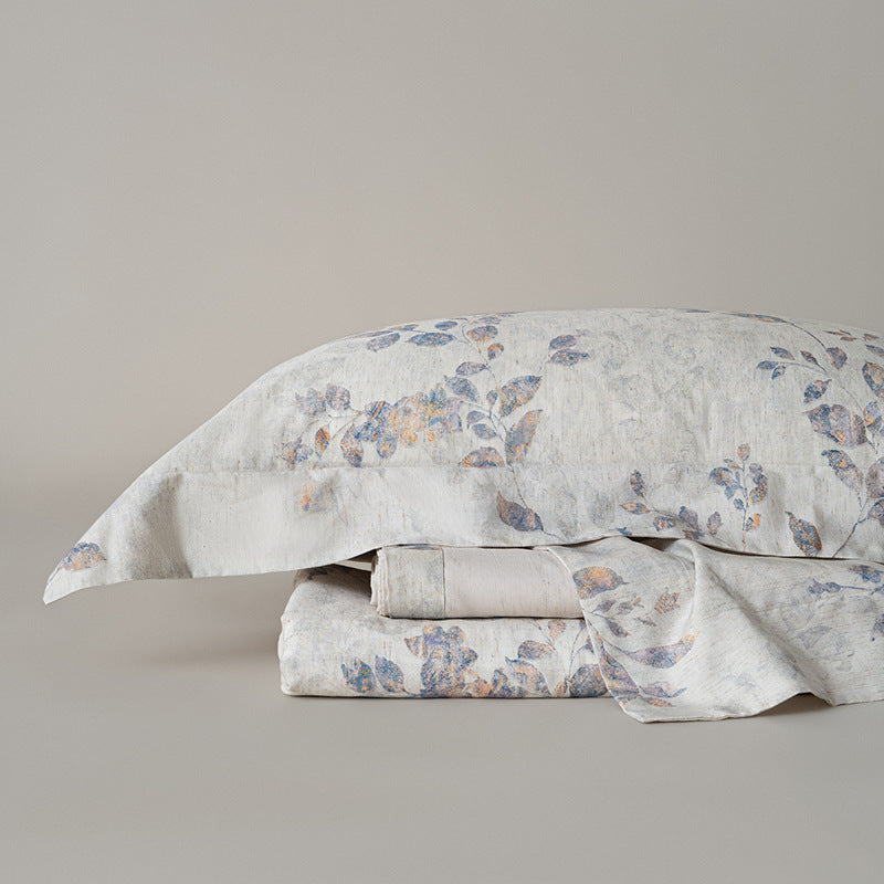 Linen-look cotton duvet cover set with delicate watercolor flower pattern and reversible function