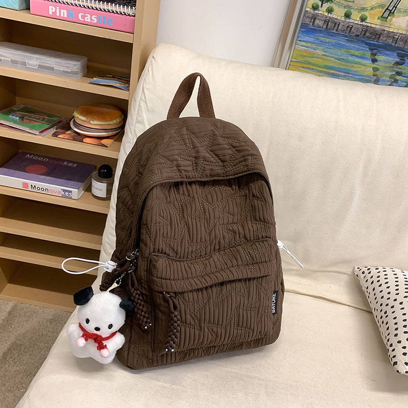 Quilted Backpack with Decorative Charm Stornfield