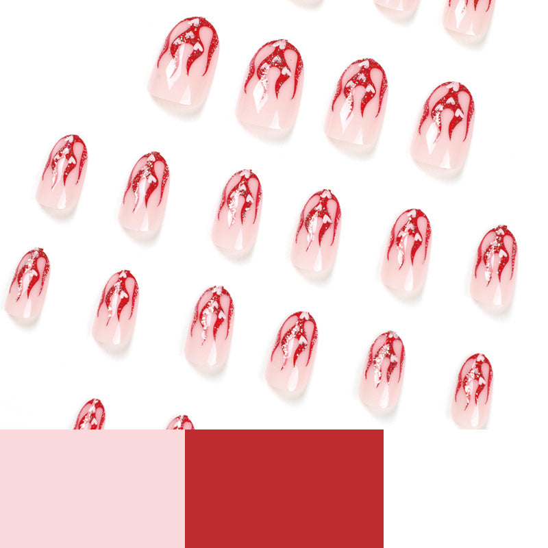 Artificial nail art with romantic heart and flame design Stornfield