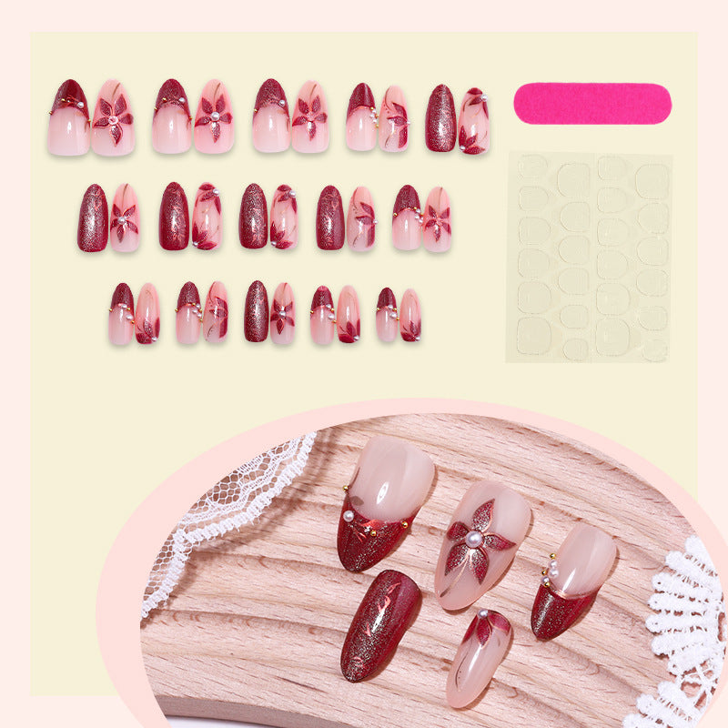 Glamorous artificial nail set with elegant floral and glitter details Stornfield