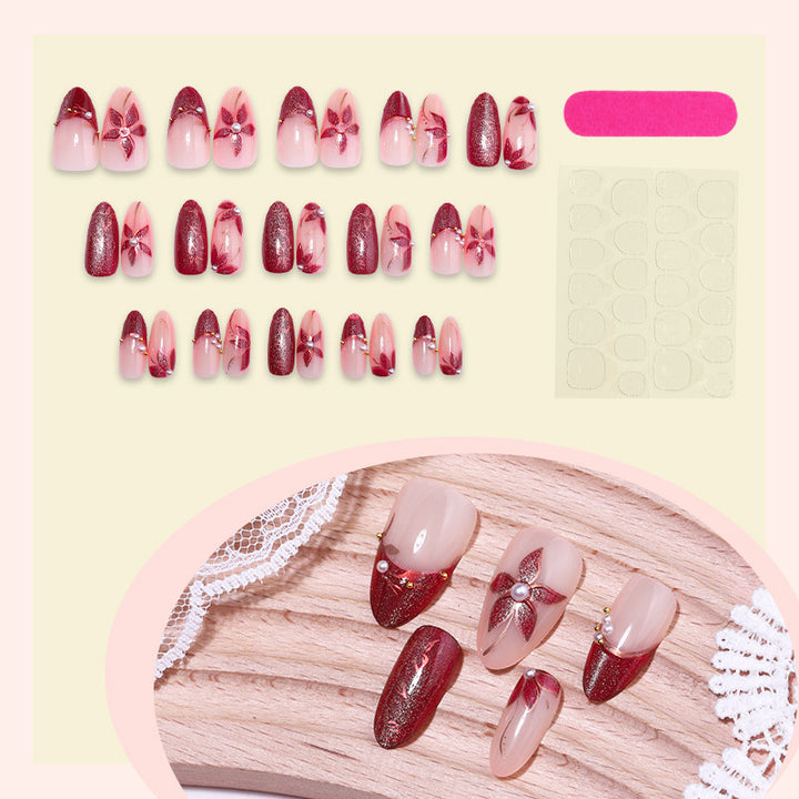Glamorous artificial nail set with elegant floral and glitter details Stornfield