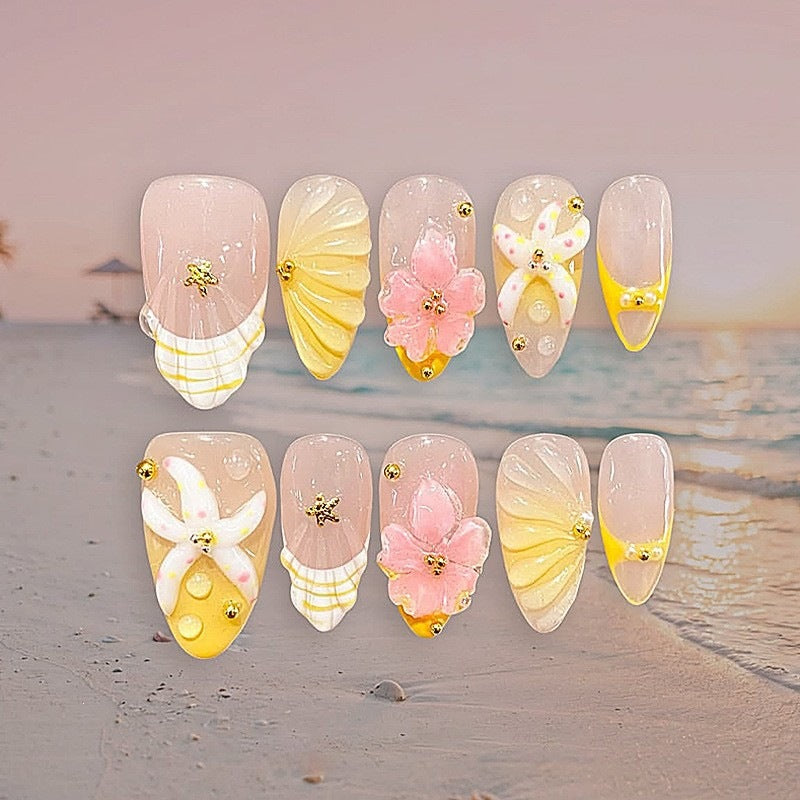 Artificial nail set with maritime motifs and colorful accents Stornfield