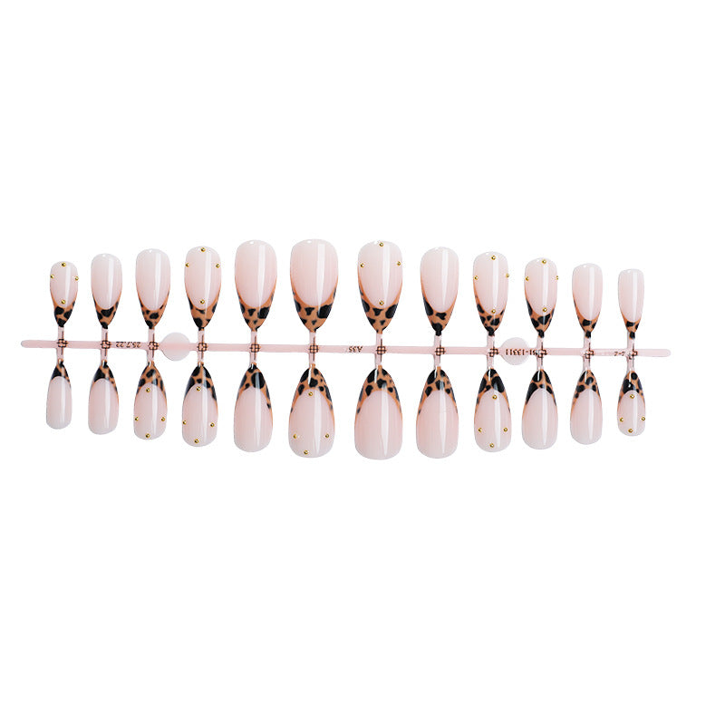 Artificial nail set with elegant leopard pattern and golden accents Stornfield