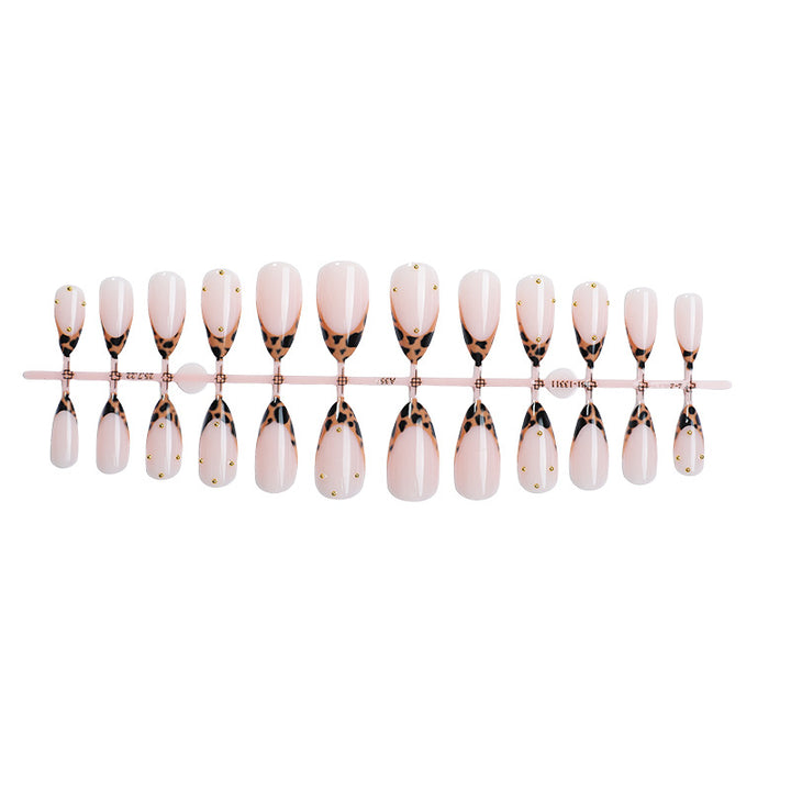Artificial nail set with elegant leopard pattern and golden accents Stornfield