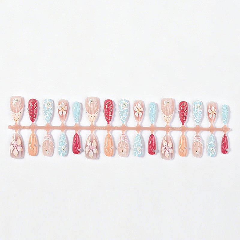 Artificial nail set with floral 3D design and glitter accents Stornfield