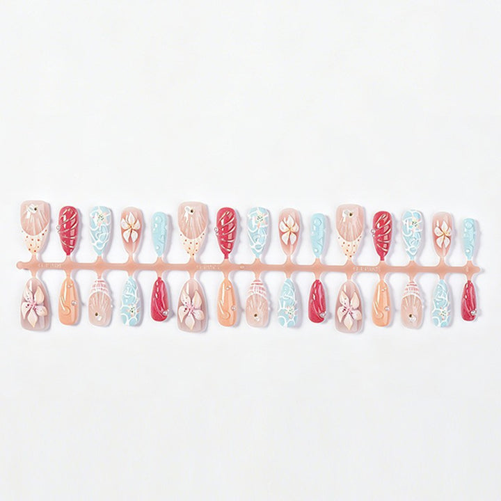 Artificial nail set with floral 3D design and glitter accents Stornfield