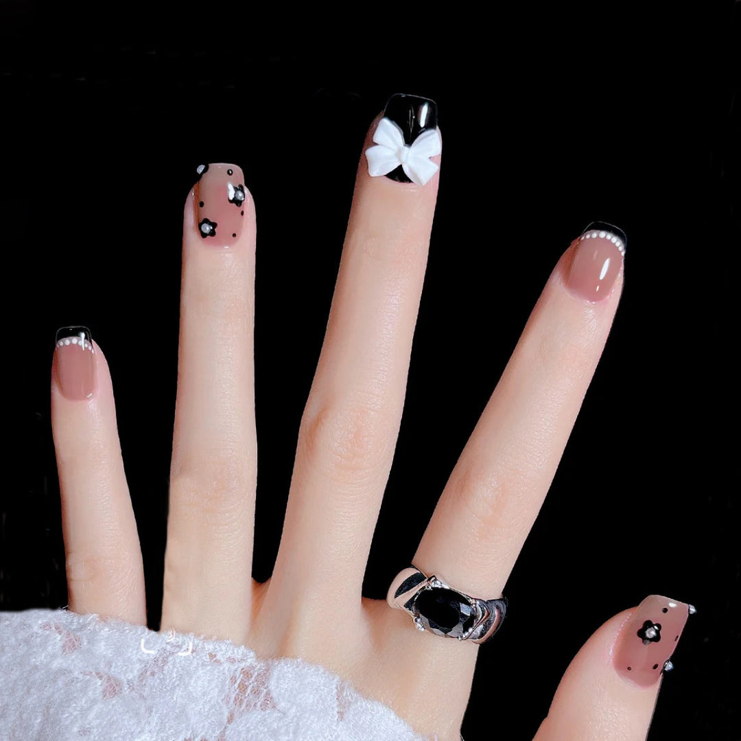 Artificial nail set with elegant bow and flower decoration Stornfield