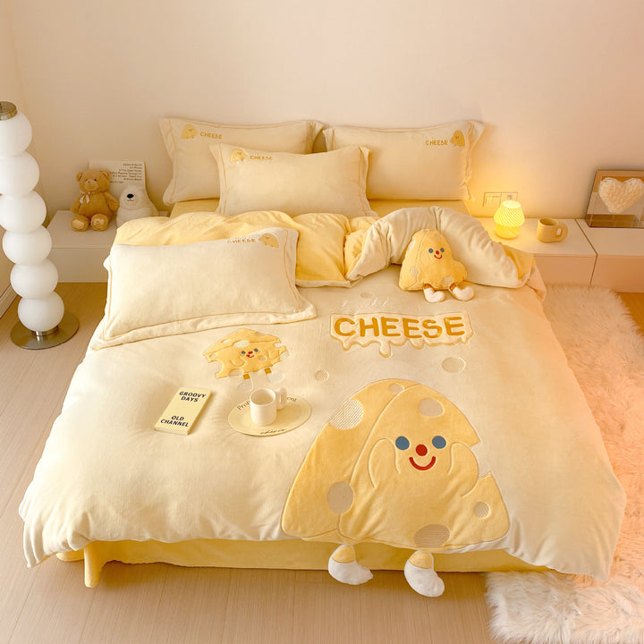 Cozy reversible bedding set with embroidered duck motif, appliqués, and Stornfield cuddle pillow