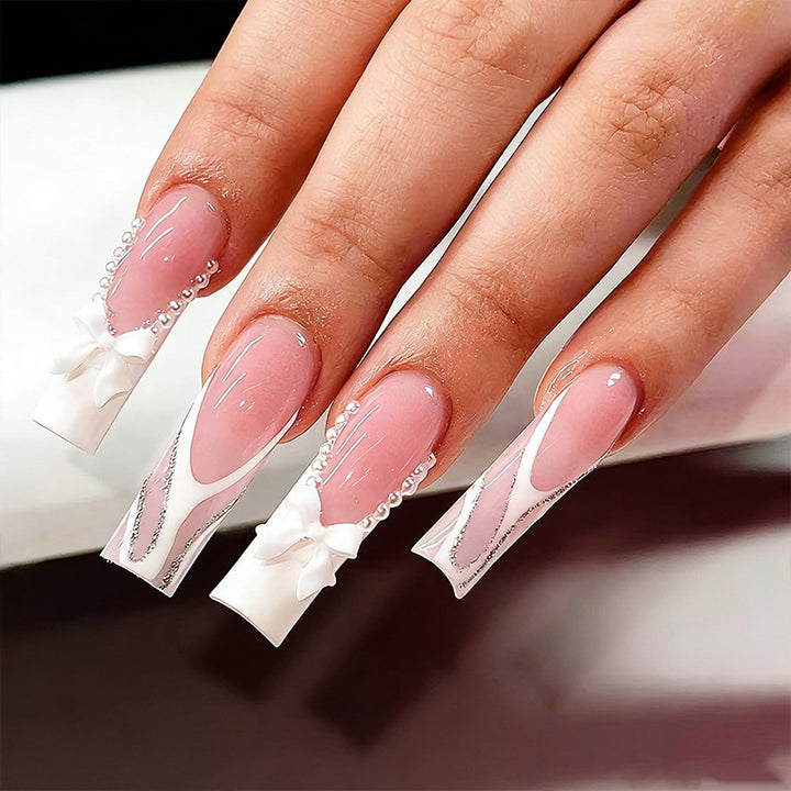 Elegant Fake Nails with Pearl and Bow Decorations Stornfield