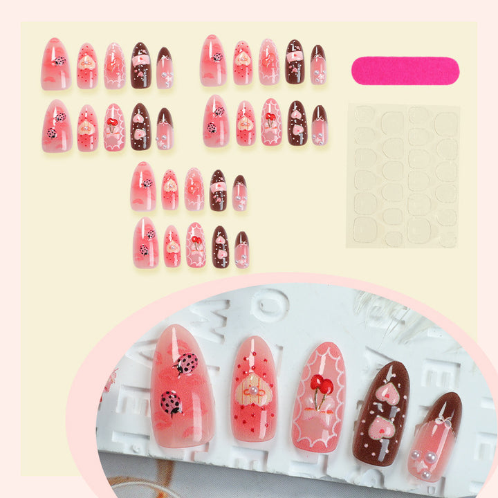 Artificial nail set with floral and playful tea motifs Stornfield