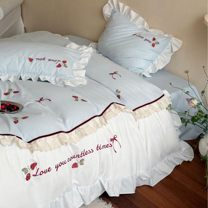 Bedding set made of breathable cotton blend with ruffle and flower bow embroidery