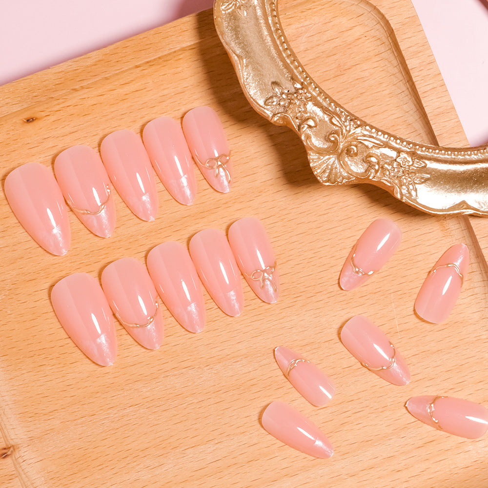 Artistic Pointed Press-On Nails with Gold Accents Stornfield