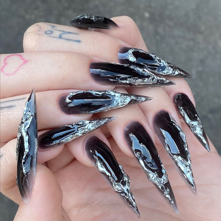 Artistic stiletto nails with modern metal effect Stornfield