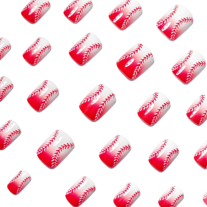 Creative acrylic nails with elegant ombre design and delicate floral patterns Stornfield