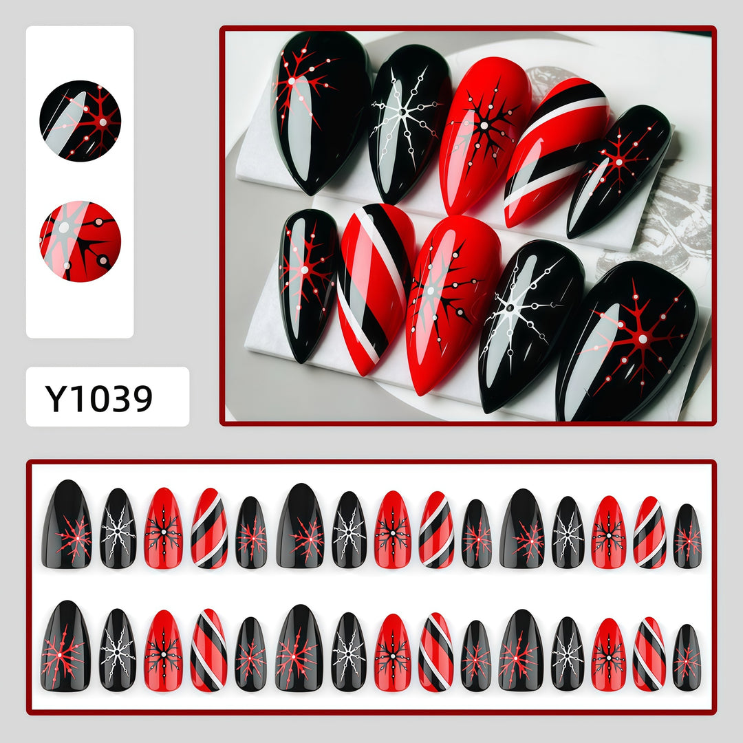Artificial nails in modern stiletto design with graphic accents Stornfield