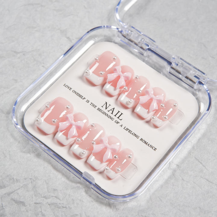 Decorative Press-On Nail Set with Bow and Pearl Accents