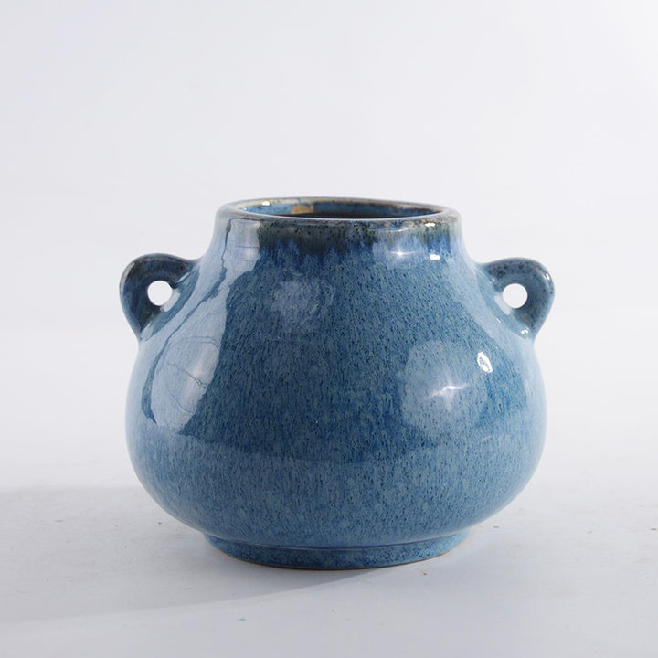 Decorative ceramic pot with playful handles Stornfield
