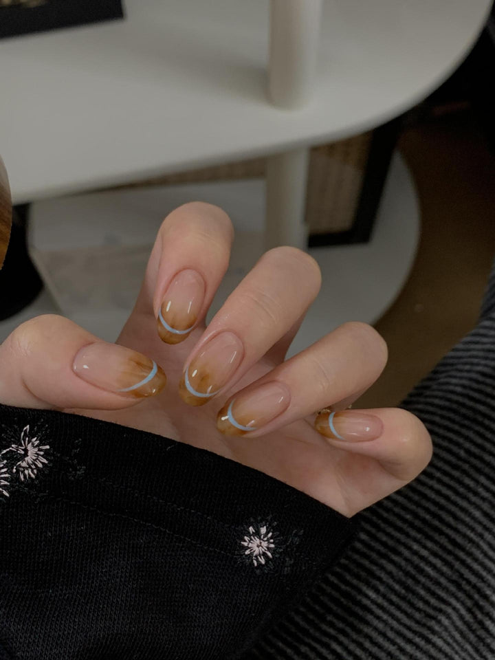 Artificial nails with modern French manicure design Stornfield
