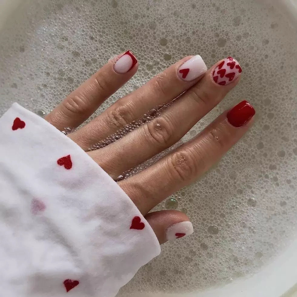 Nail art set with romantic heart designs and elegant shine Stornfield