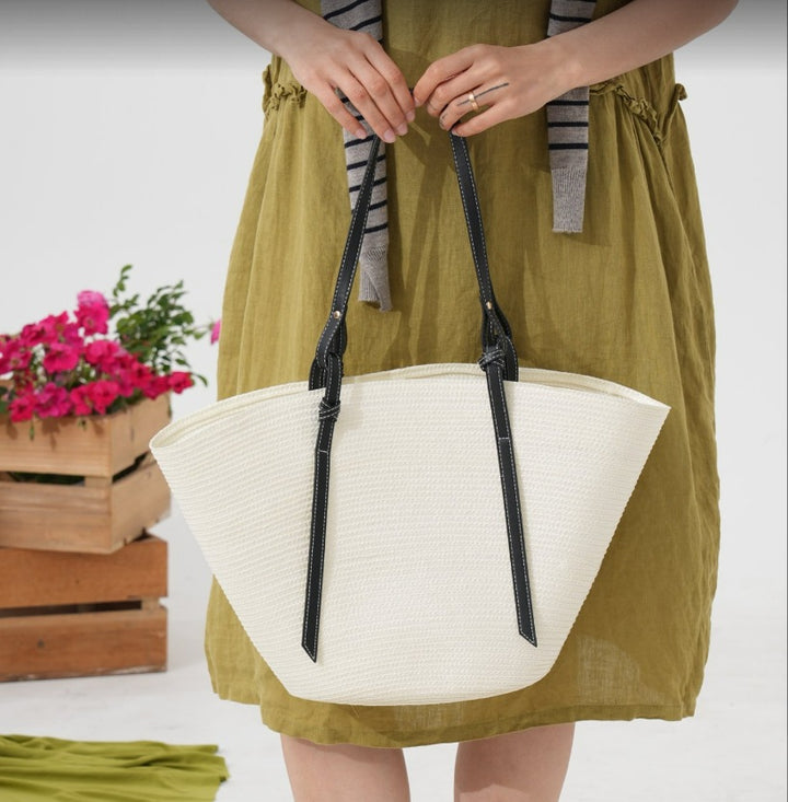 Elegant Beach Bag Made of Woven Natural Material with Leather Accents Stornfield