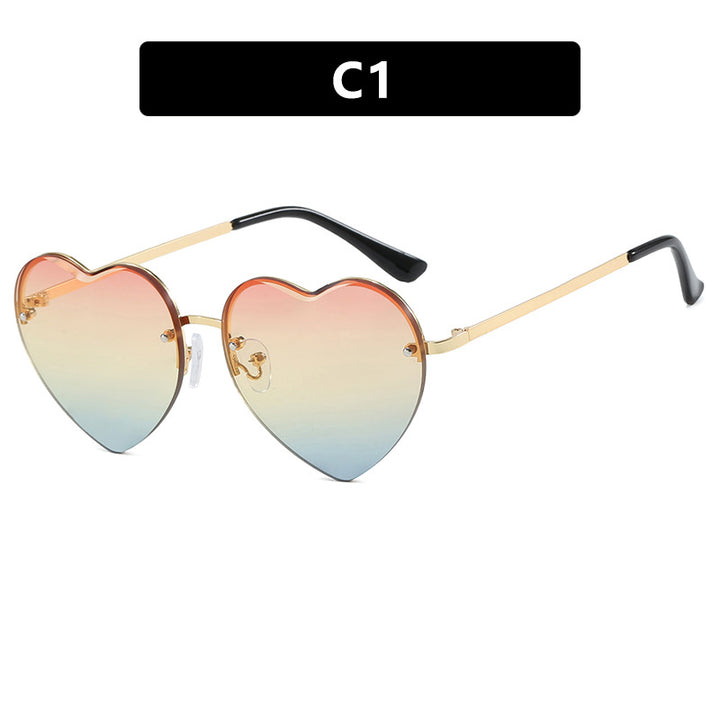 Women's Heart-Shaped Sunglasses with Mirrored Lenses and Fashionable Metal Frame Stornfield