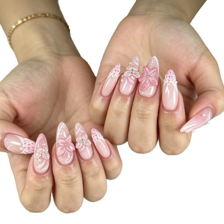 Artificial nails with romantic flower and butterfly accents Stornfield
