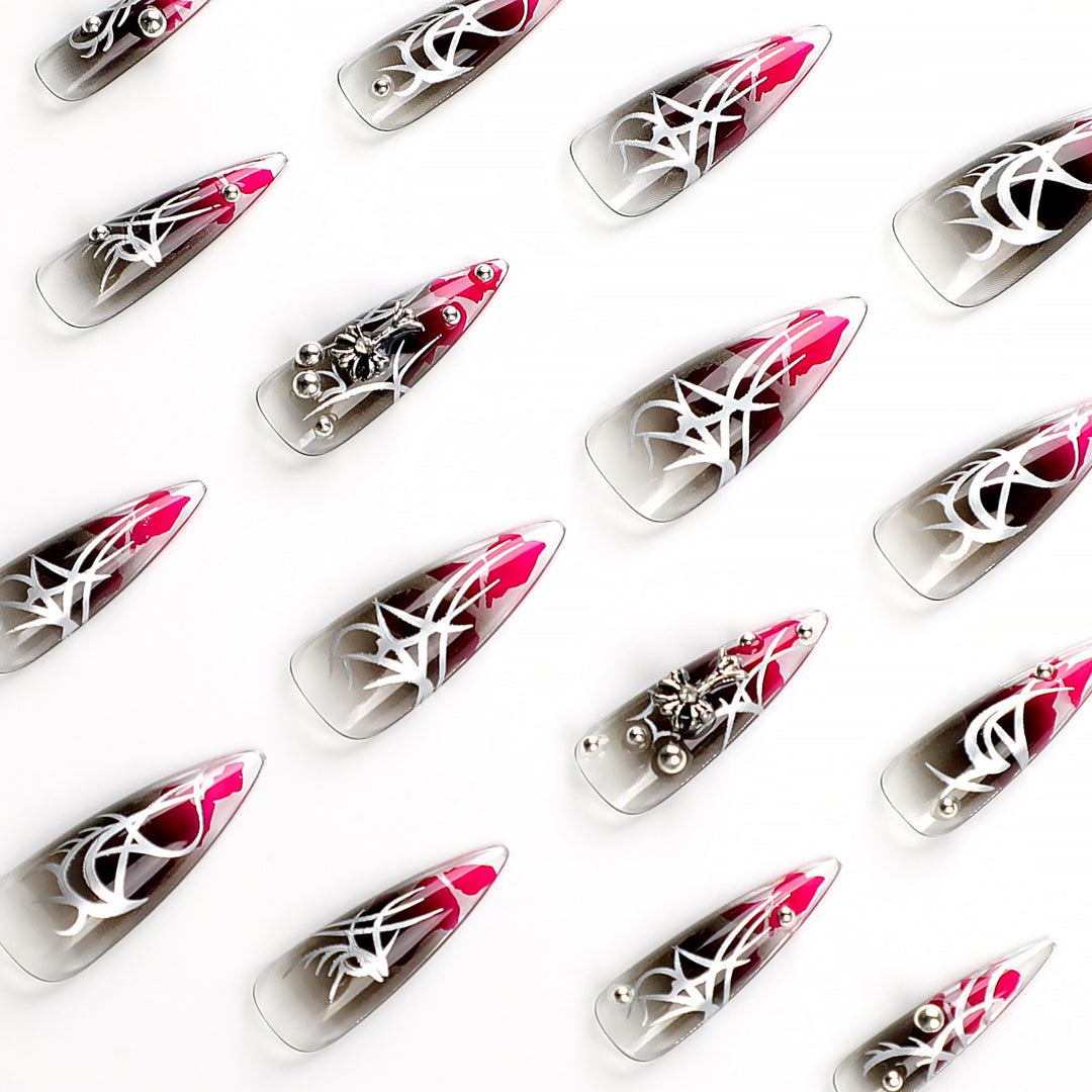 Artful stiletto nails with elegant decoration and modern accents Stornfield