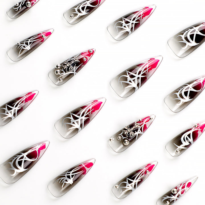 Artful stiletto nails with elegant decoration and modern accents Stornfield