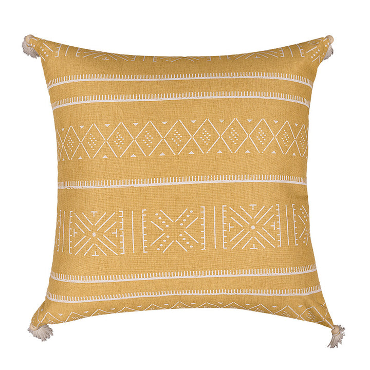 Square decorative cushion cover made of cotton blend with handwoven texture, geometric diamond print, and corner tassels
