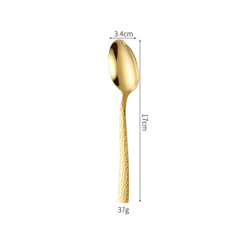 Elegant spoon with unique surface design Stornfield