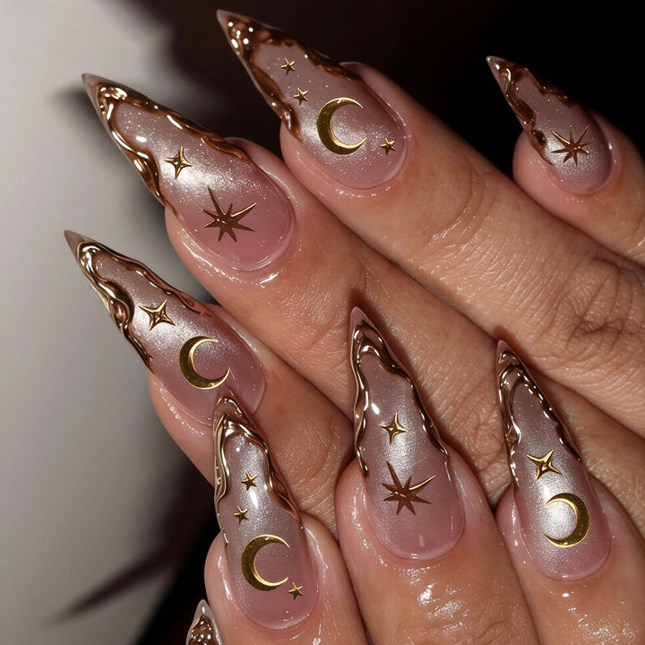 Artistic Stiletto Nail Art Tips with Celestial Accents Stornfield