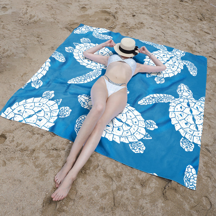 Beach blanket with colorful turtle pattern Stornfield