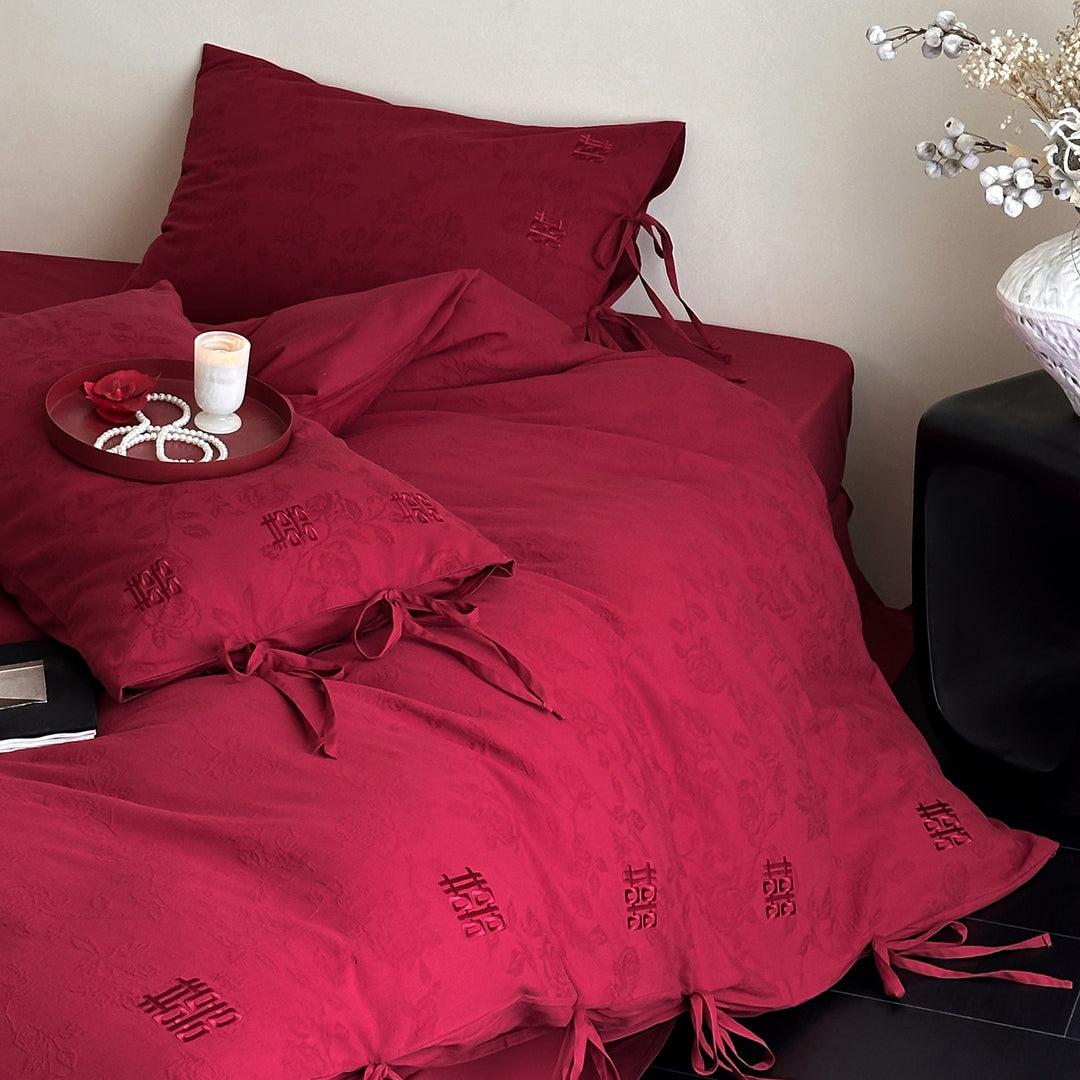 Luxurious cotton satin bedding set with decorative ribbons and jacquard texture