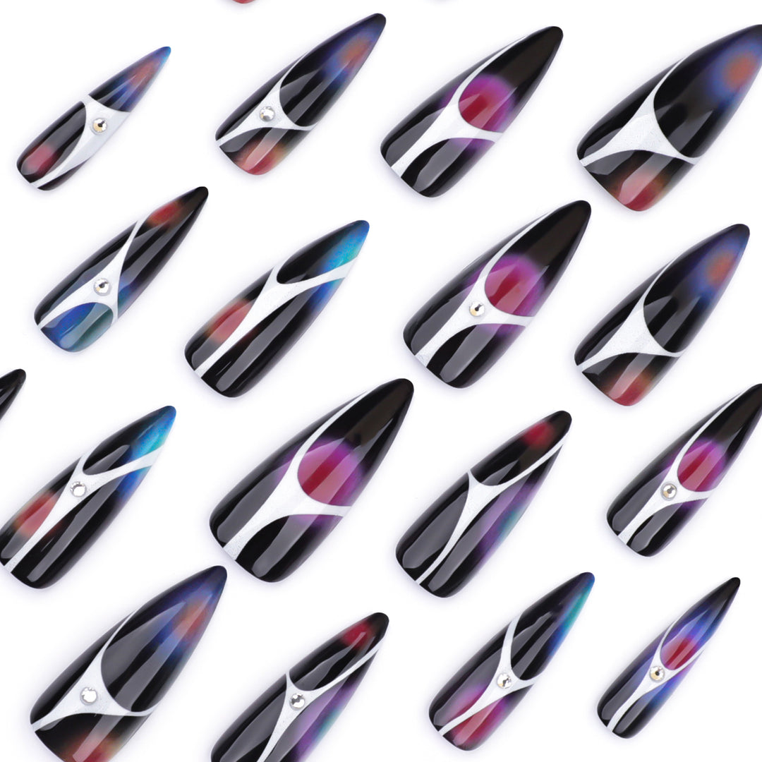 Artful stiletto nails with sparkling accents and geometric design Stornfield