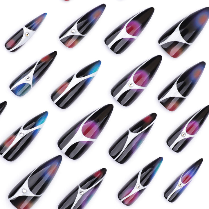 Artful stiletto nails with sparkling accents and geometric design Stornfield