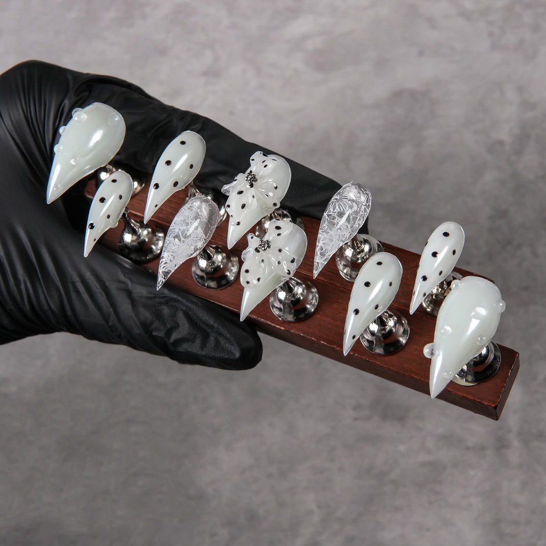 Artistic Stiletto Press-On Nail Set with Unique Designs