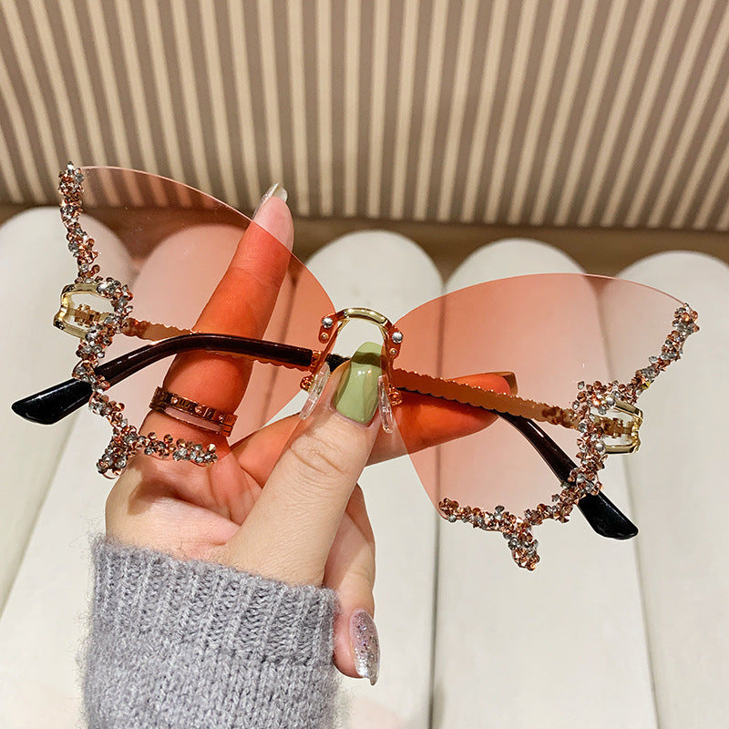 Women's extravagant sunglasses with sparkling butterfly design Stornfield
