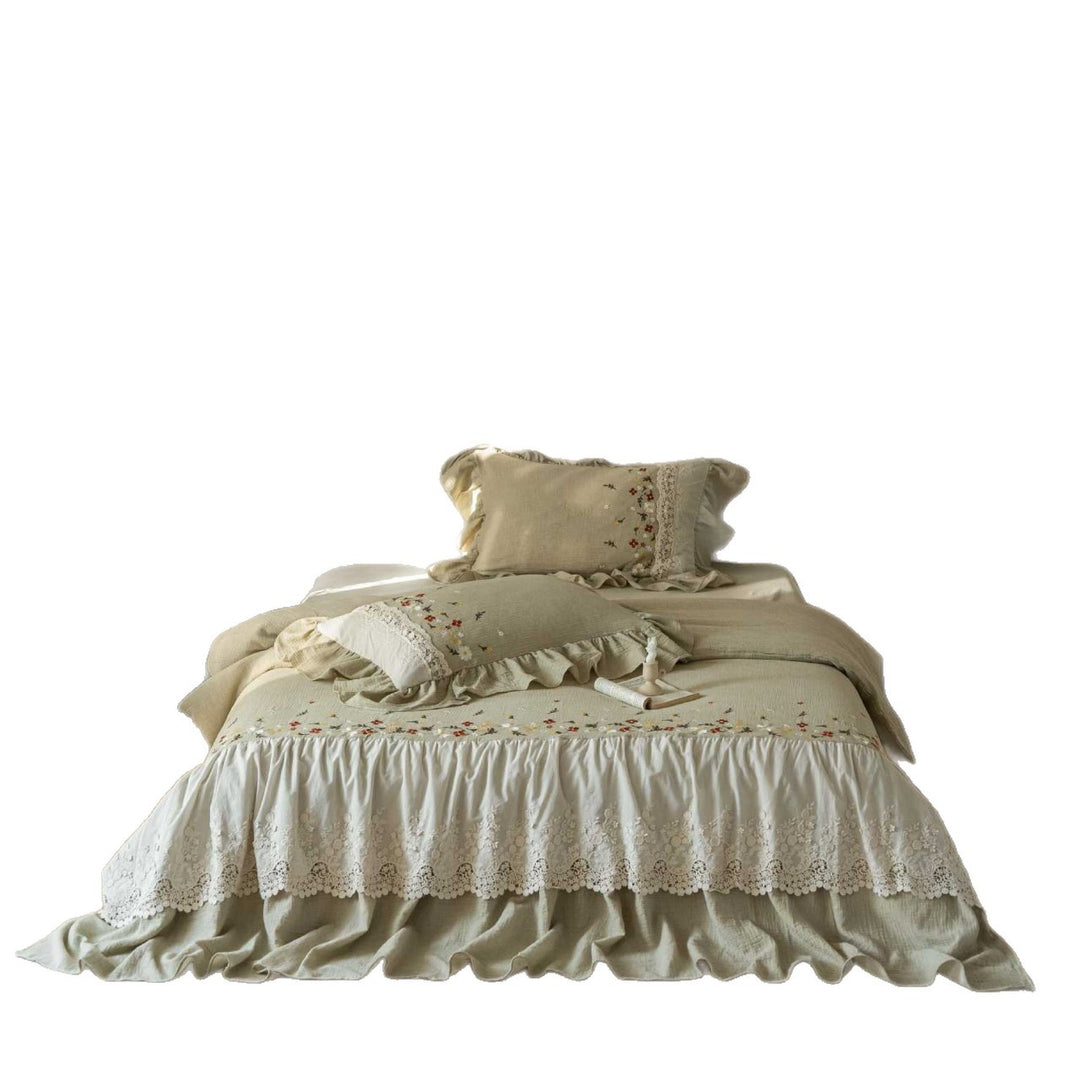 Romantic bedding set with lace bed skirt, embroidered floral decor and ruffle